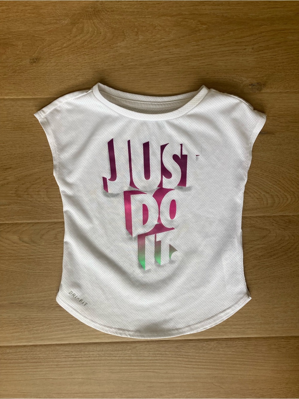 Nike Toddler Athletic Dri-Fit White Tee with 'Just Do It' Graphic